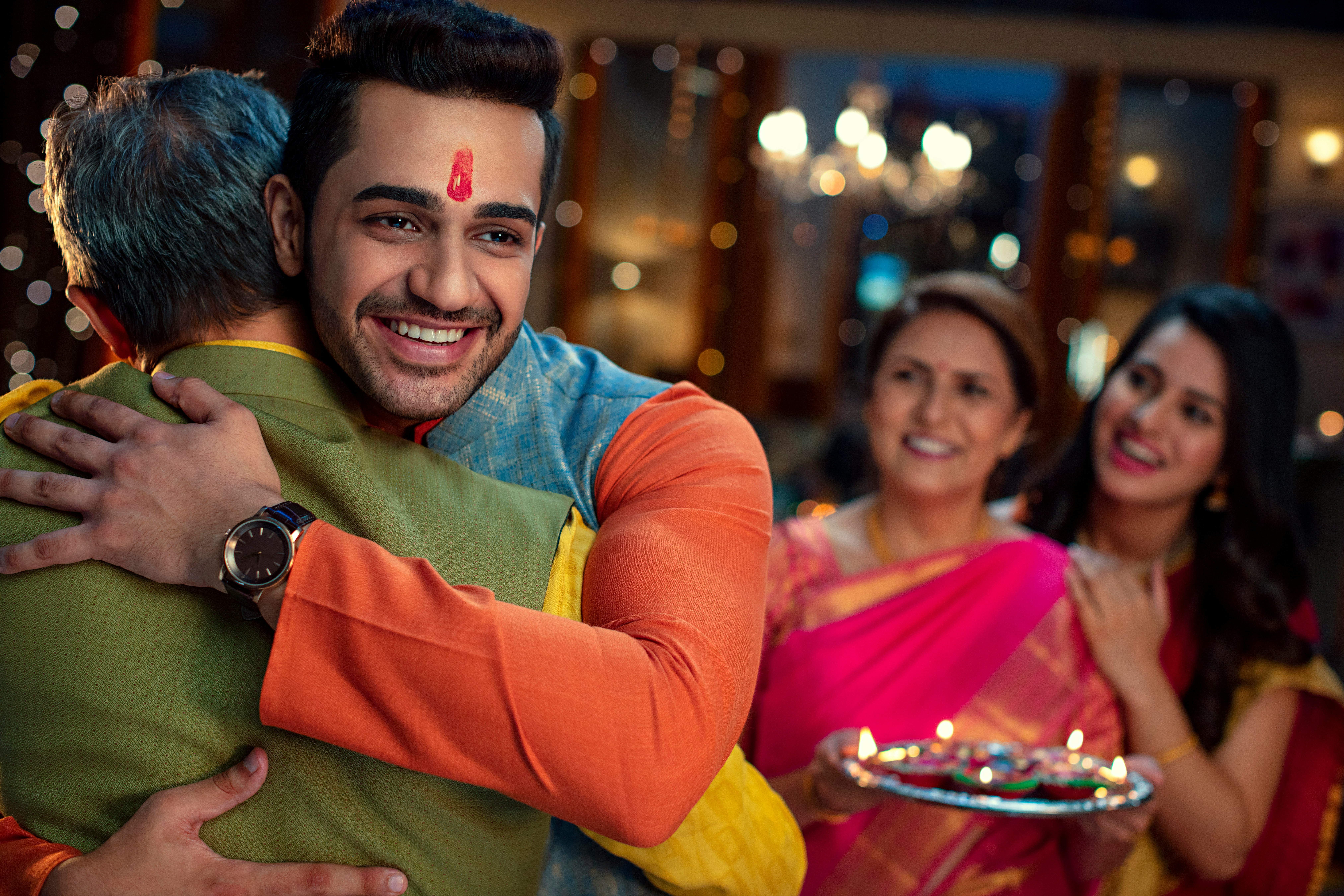 Warm family embrace at a private celebratory gathering