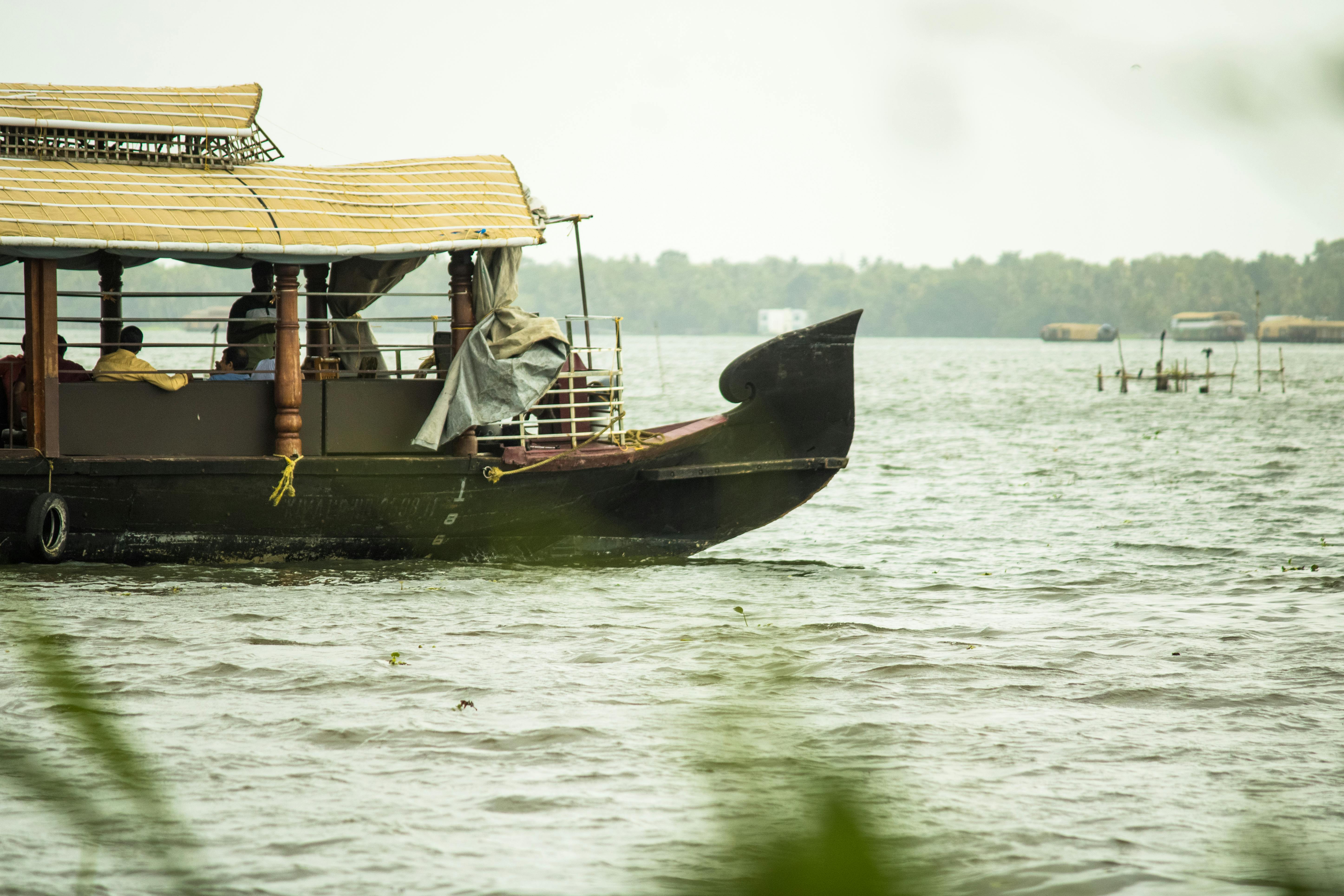 Kerala houseboat on the backwaters at dusk