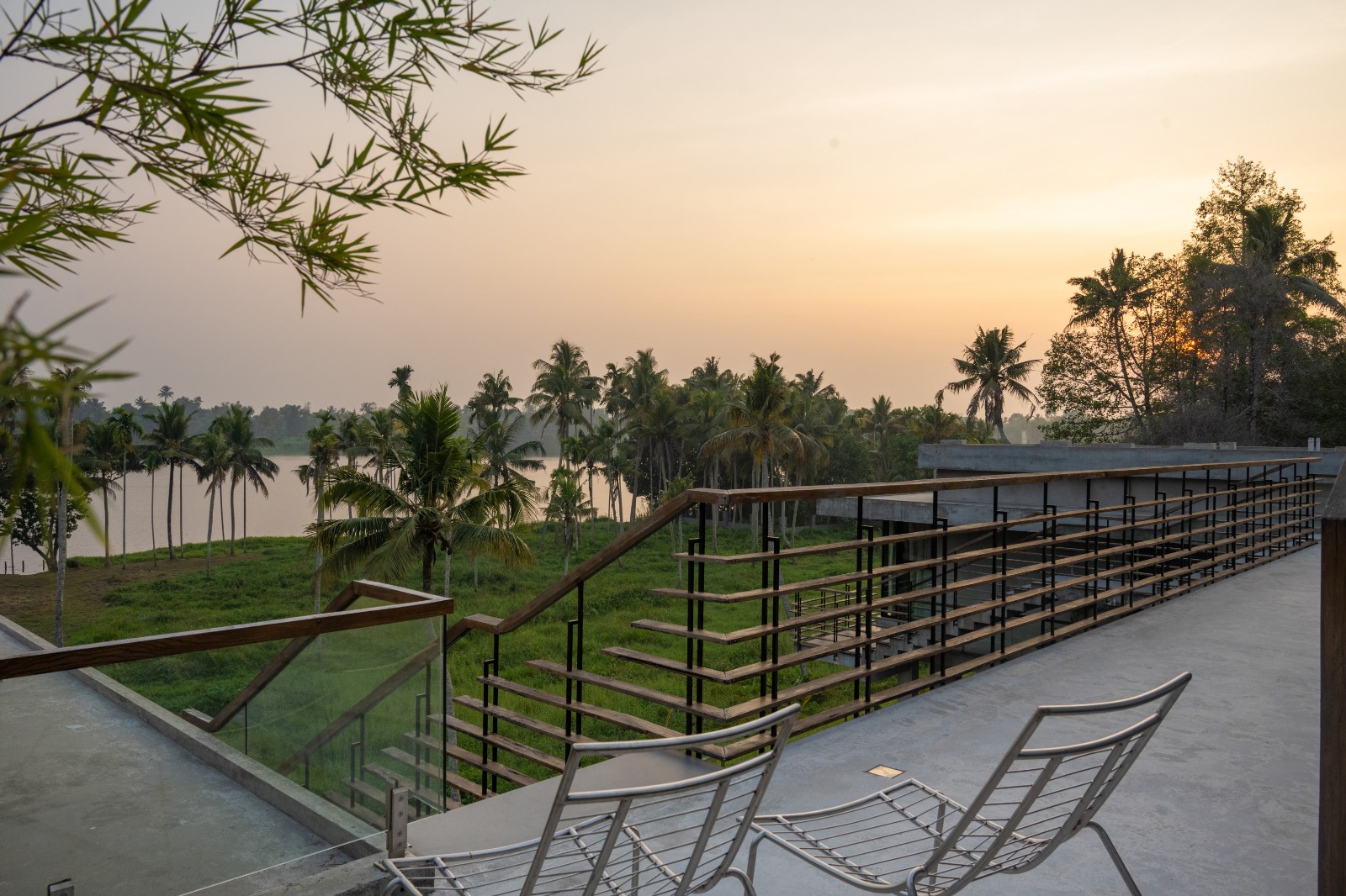 Sovnear rooftop terrace overlooking the backwaters at golden hour